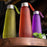 Plastic fridge water set with steel finish caps, three 1-liter bottles