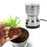 Electric spice grinder with stainless steel bowl for home use.