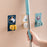 Self-adhesive wall mount for holding mops and brooms securely.